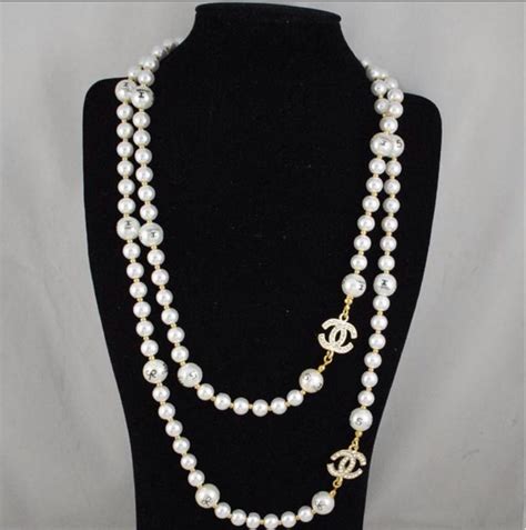 chanel pearl necklace and earrings.